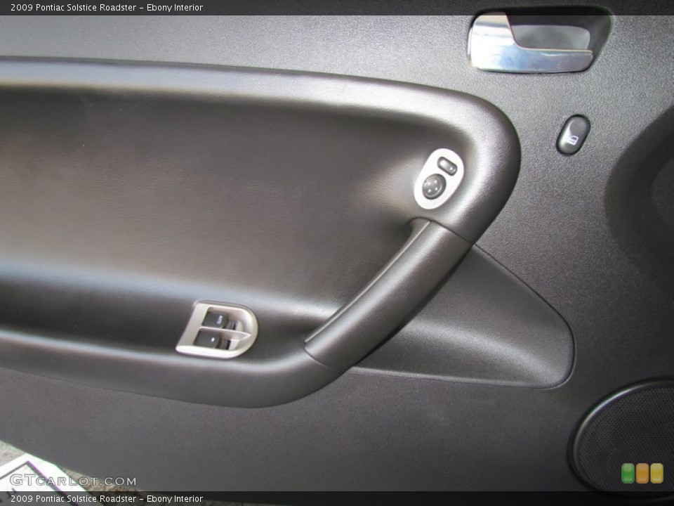 Ebony Interior Door Panel for the 2009 Pontiac Solstice Roadster #50448926