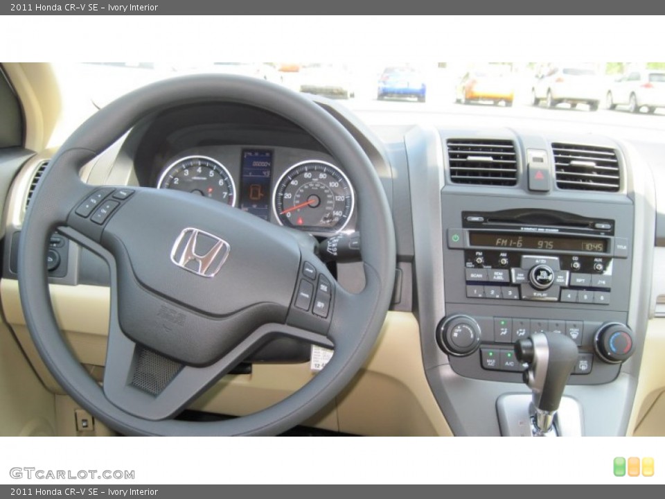 Ivory Interior Dashboard for the 2011 Honda CR-V SE #50454338