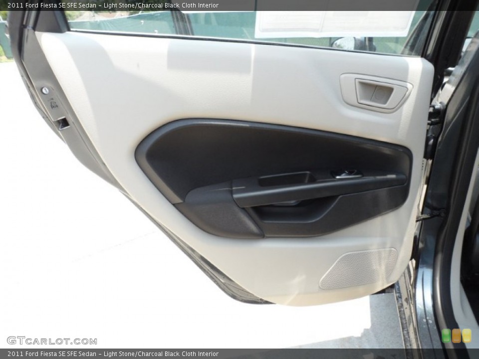 Light Stone/Charcoal Black Cloth Interior Door Panel for the 2011 Ford Fiesta SE SFE Sedan #50468062