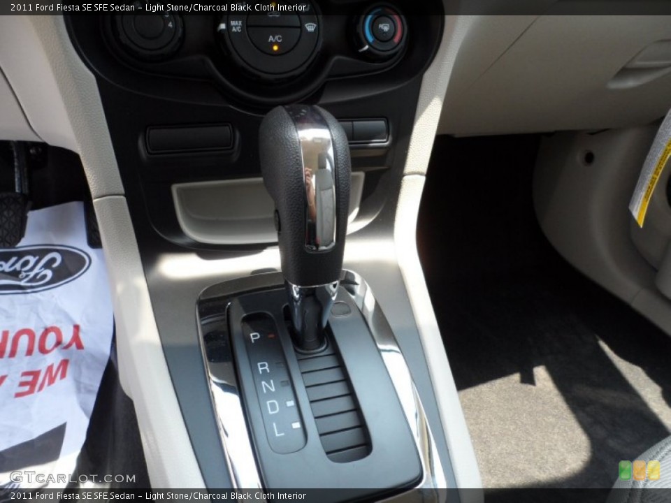 Light Stone/Charcoal Black Cloth Interior Transmission for the 2011 Ford Fiesta SE SFE Sedan #50468227