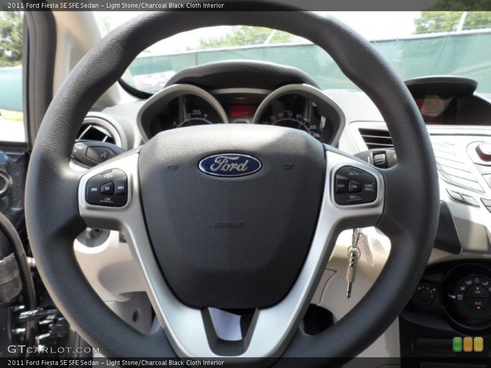 Light Stone/Charcoal Black Cloth Interior Steering Wheel for the 2011 Ford Fiesta SE SFE Sedan #50468239