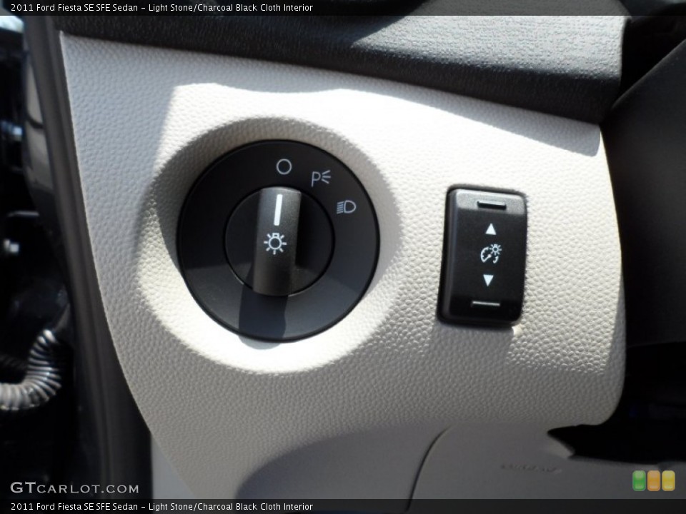 Light Stone/Charcoal Black Cloth Interior Controls for the 2011 Ford Fiesta SE SFE Sedan #50468263