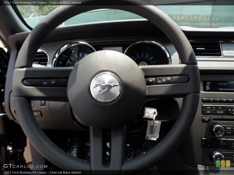 Charcoal Black Interior Steering Wheel for the 2012 Ford Mustang V6 Coupe #50470354