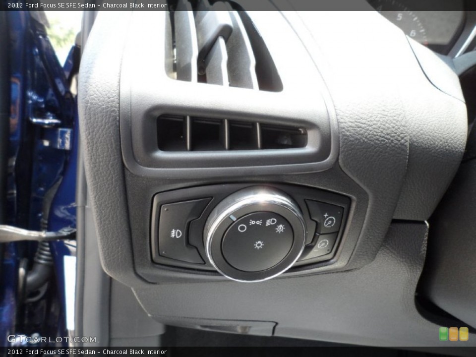 Charcoal Black Interior Controls for the 2012 Ford Focus SE SFE Sedan #50470927