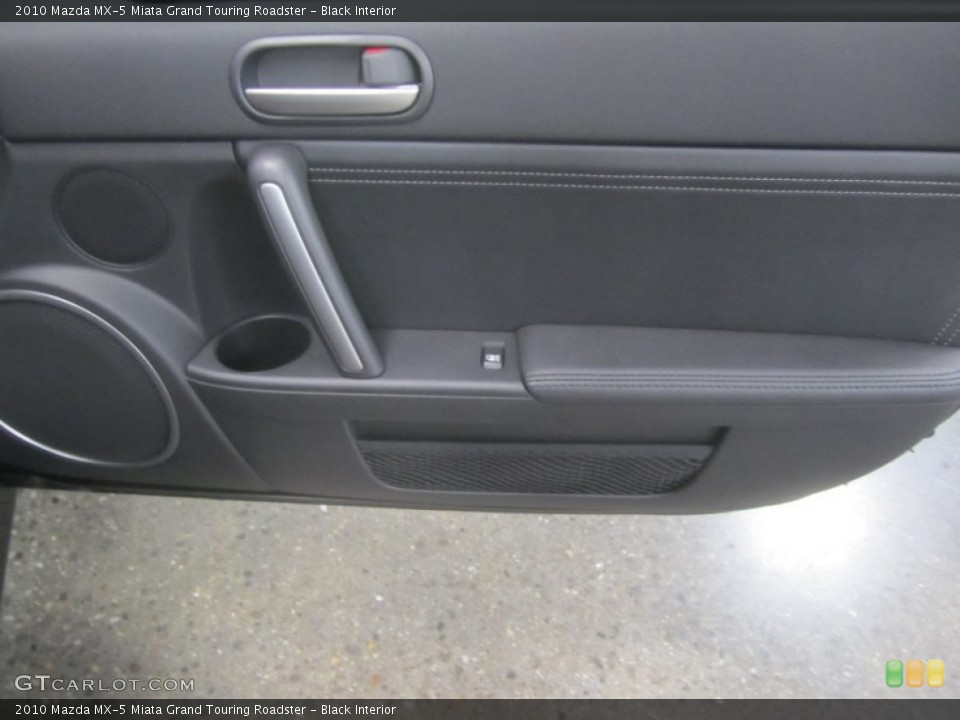 Black Interior Door Panel for the 2010 Mazda MX-5 Miata Grand Touring Roadster #50493091