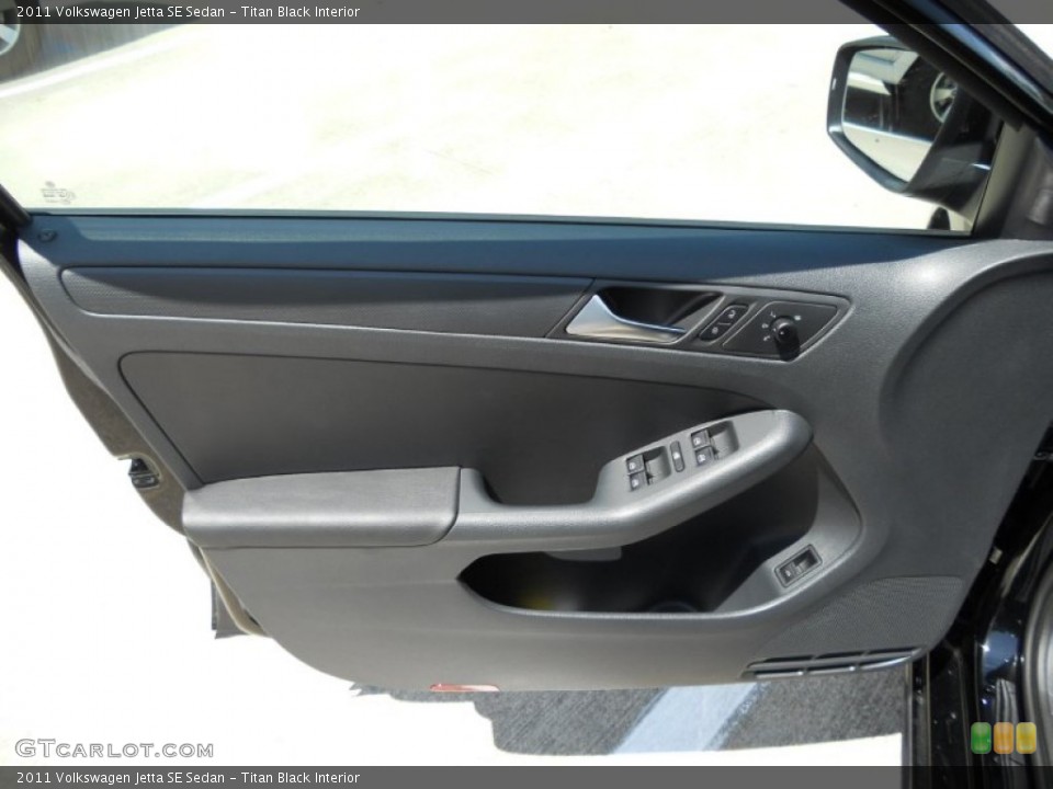 Titan Black Interior Door Panel for the 2011 Volkswagen Jetta SE Sedan #50536155