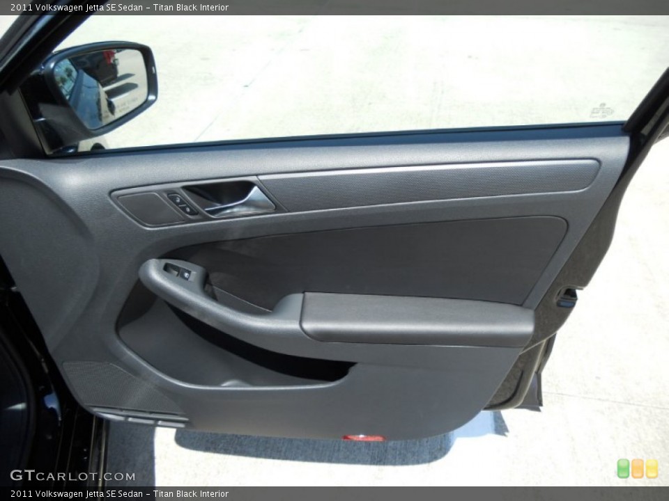 Titan Black Interior Door Panel for the 2011 Volkswagen Jetta SE Sedan #50536186