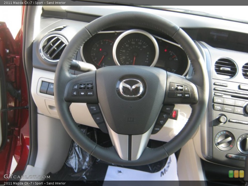 Sand Interior Steering Wheel for the 2011 Mazda CX-7 i Sport #50562496