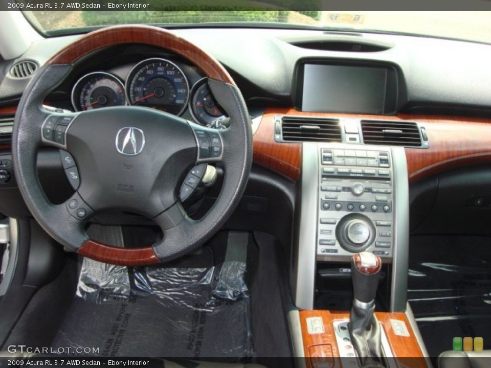 Ebony Interior Dashboard for the 2009 Acura RL 3.7 AWD Sedan #50563822