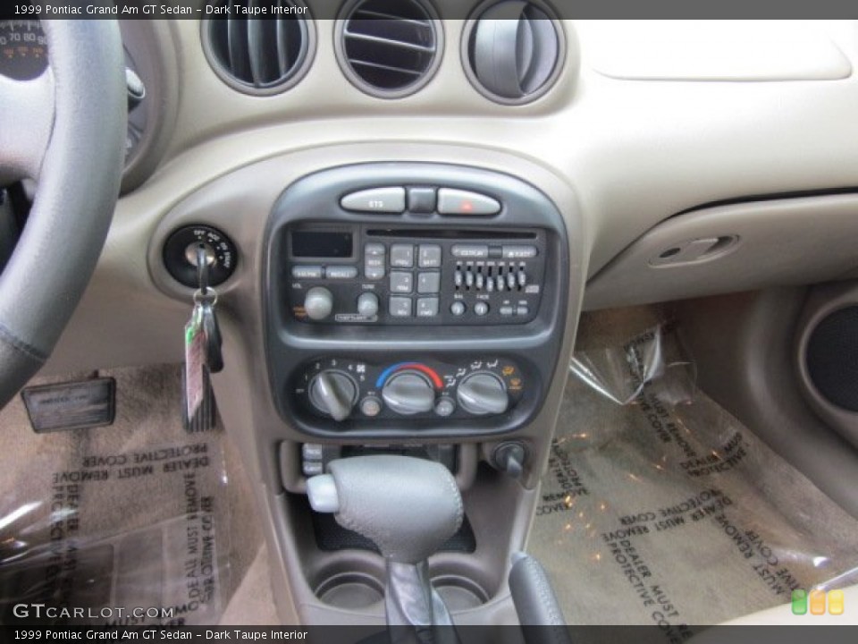 Dark Taupe Interior Controls for the 1999 Pontiac Grand Am GT Sedan #50570284