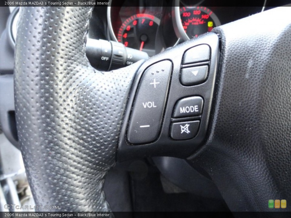 Black/Blue Interior Controls for the 2006 Mazda MAZDA3 s Touring Sedan #50572663