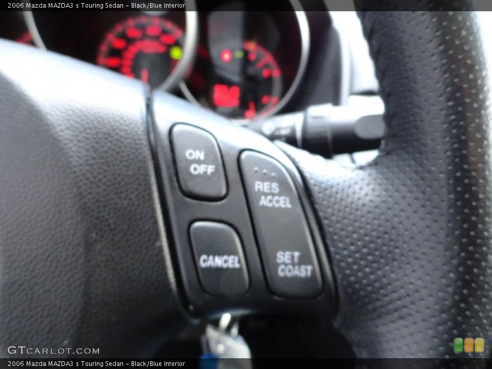 Black/Blue Interior Controls for the 2006 Mazda MAZDA3 s Touring Sedan #50572676