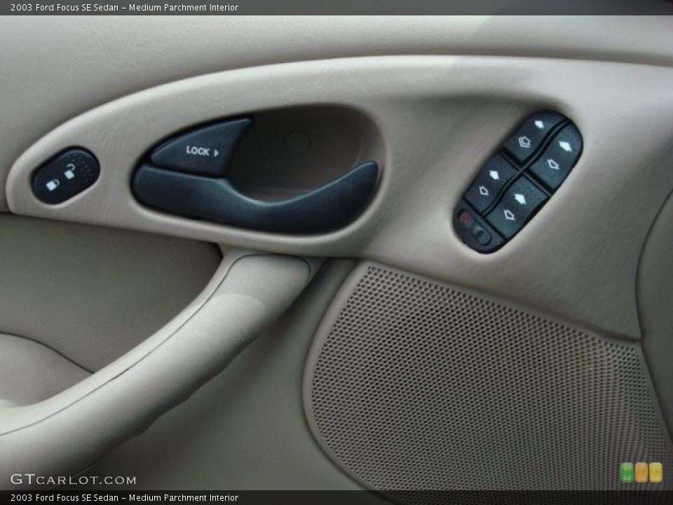 Medium Parchment Interior Controls for the 2003 Ford Focus SE Sedan #50575864