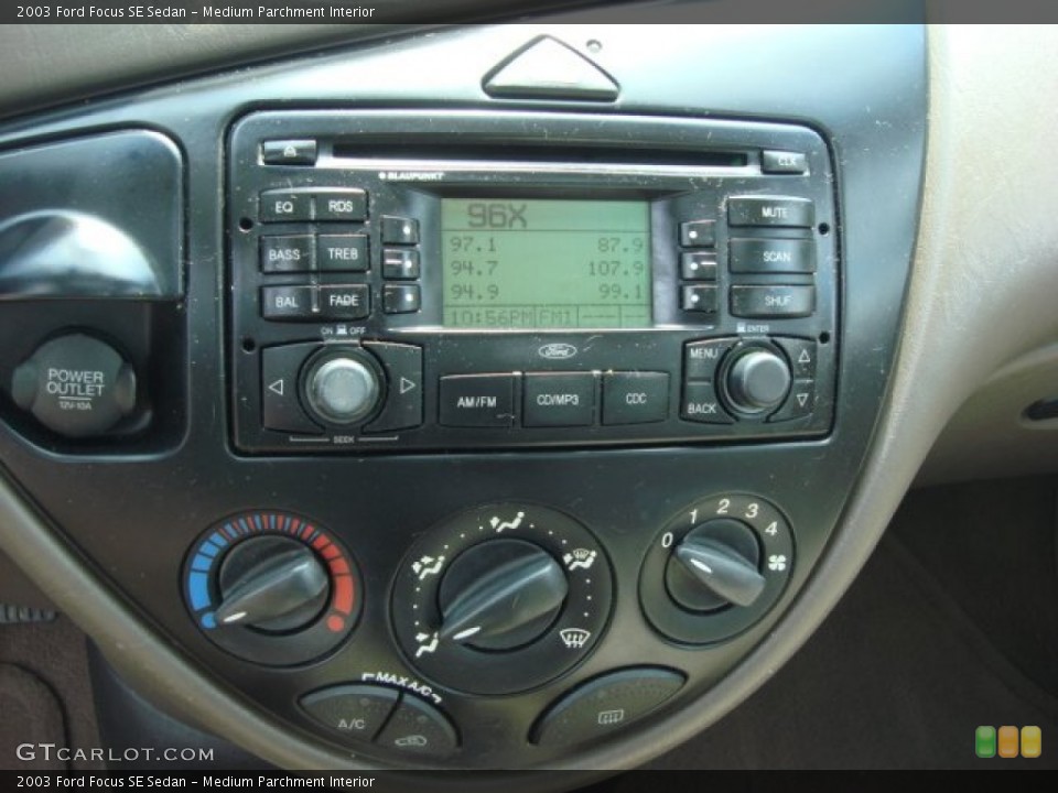 Medium Parchment Interior Controls for the 2003 Ford Focus SE Sedan #50575897
