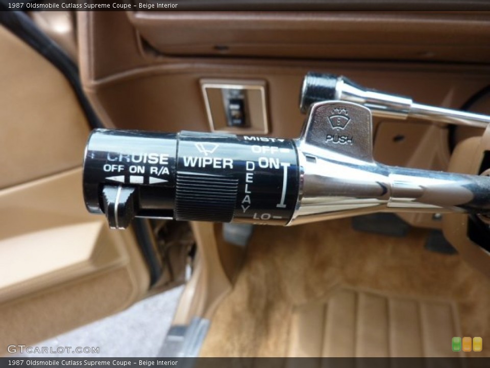 Beige Interior Controls for the 1987 Oldsmobile Cutlass Supreme Coupe #50610540