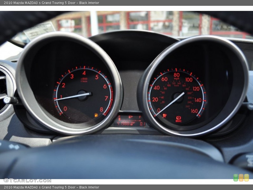 Black Interior Gauges for the 2010 Mazda MAZDA3 s Grand Touring 5 Door #50613249