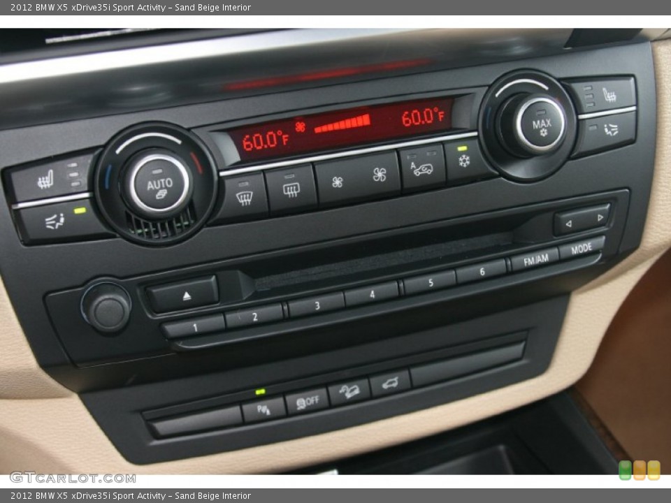 Sand Beige Interior Controls for the 2012 BMW X5 xDrive35i Sport Activity #50617155