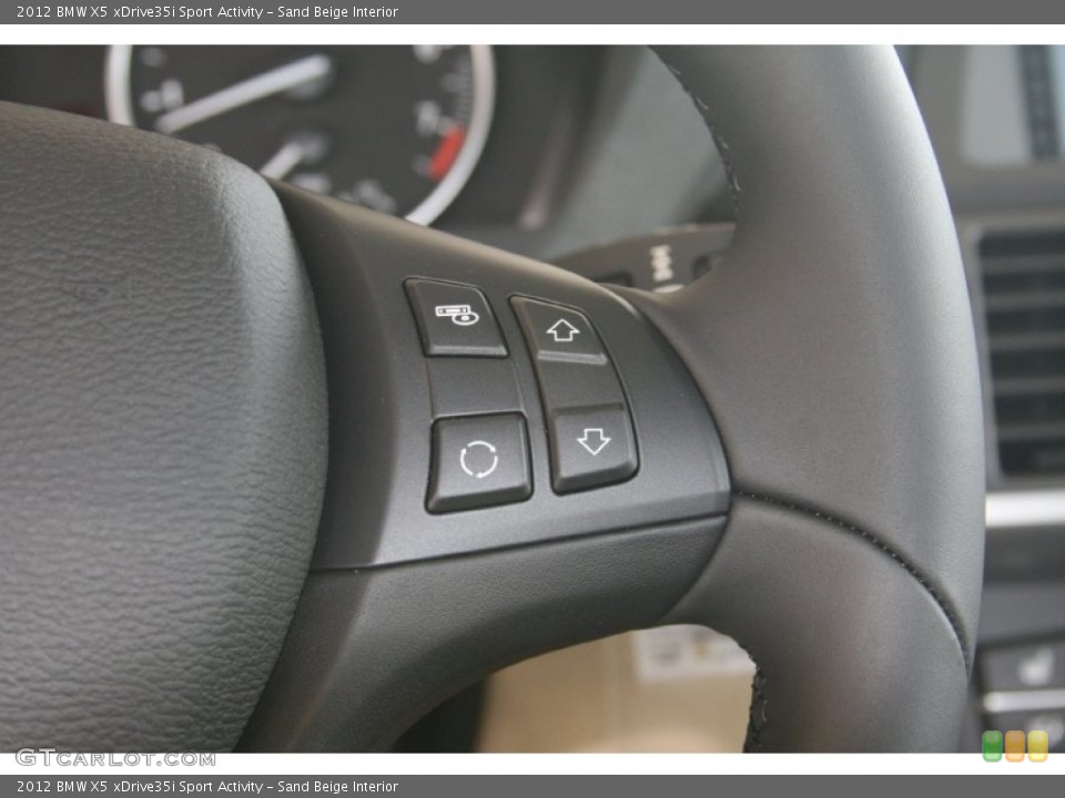 Sand Beige Interior Controls for the 2012 BMW X5 xDrive35i Sport Activity #50617200
