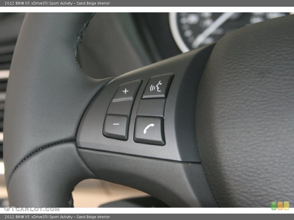 Sand Beige Interior Controls for the 2012 BMW X5 xDrive35i Sport Activity #50617215