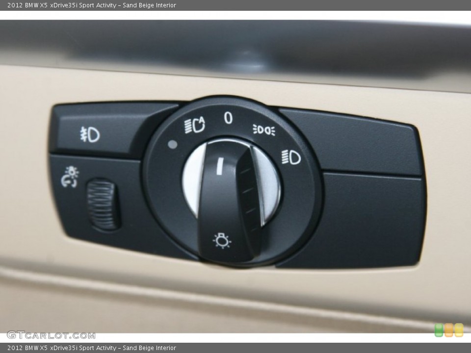 Sand Beige Interior Controls for the 2012 BMW X5 xDrive35i Sport Activity #50617230