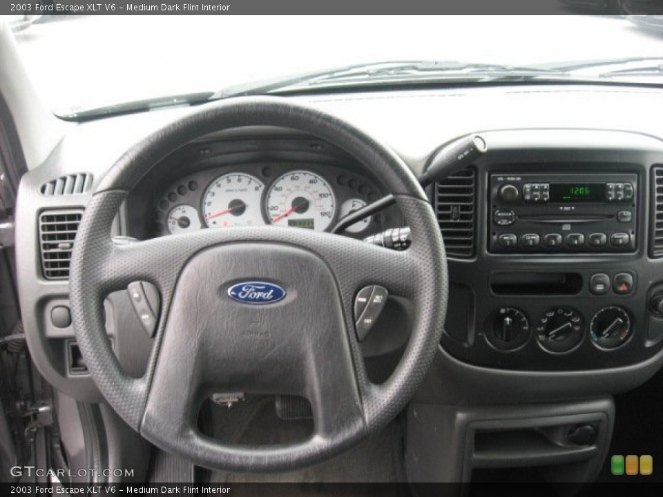 Medium Dark Flint Interior Dashboard for the 2003 Ford Escape XLT V6 #50618508
