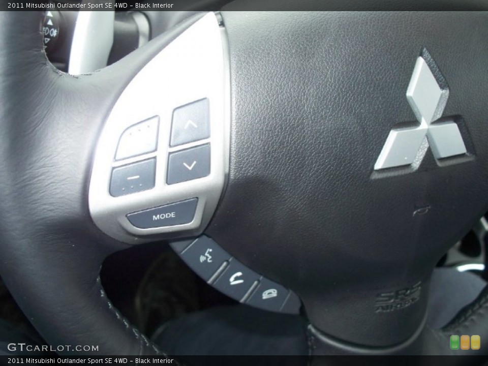 Black Interior Controls for the 2011 Mitsubishi Outlander Sport SE 4WD #50628216