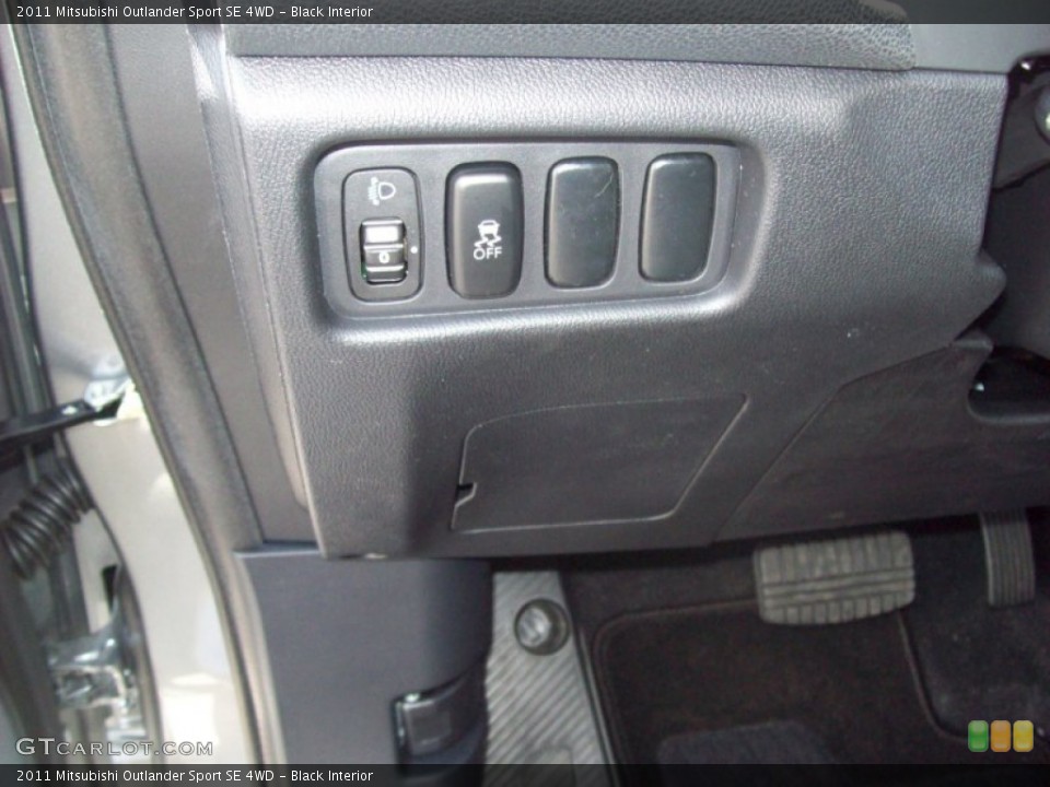 Black Interior Controls for the 2011 Mitsubishi Outlander Sport SE 4WD #50628770