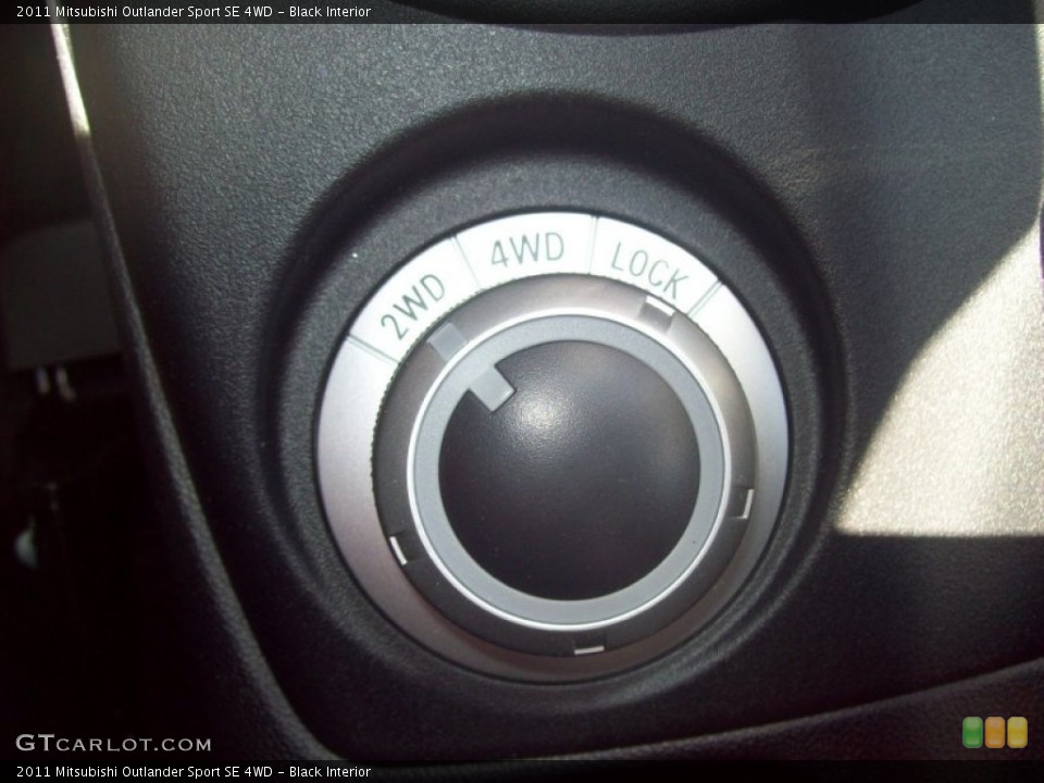 Black Interior Controls for the 2011 Mitsubishi Outlander Sport SE 4WD #50628906