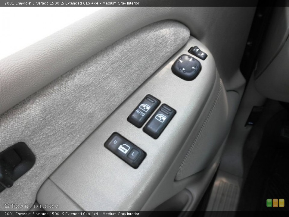 Medium Gray Interior Controls for the 2001 Chevrolet Silverado 1500 LS Extended Cab 4x4 #50643384