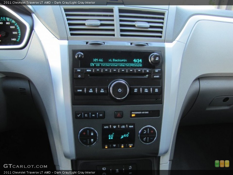 Dark Gray/Light Gray Interior Controls for the 2011 Chevrolet Traverse LT AWD #50646669