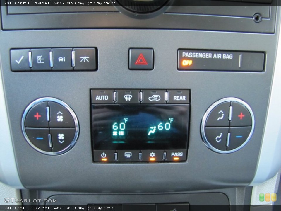 Dark Gray/Light Gray Interior Controls for the 2011 Chevrolet Traverse LT AWD #50646678