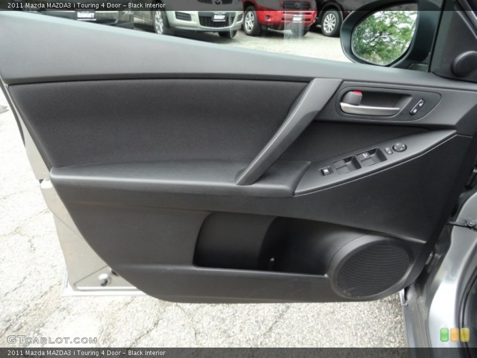 Black Interior Door Panel for the 2011 Mazda MAZDA3 i Touring 4 Door #50655202
