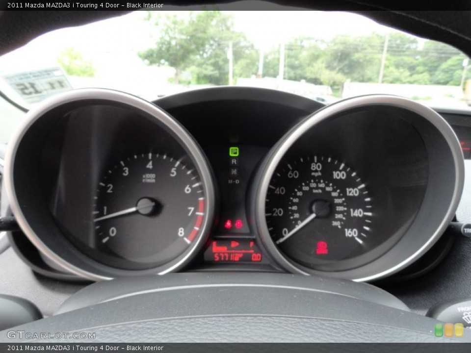 Black Interior Gauges for the 2011 Mazda MAZDA3 i Touring 4 Door #50655313