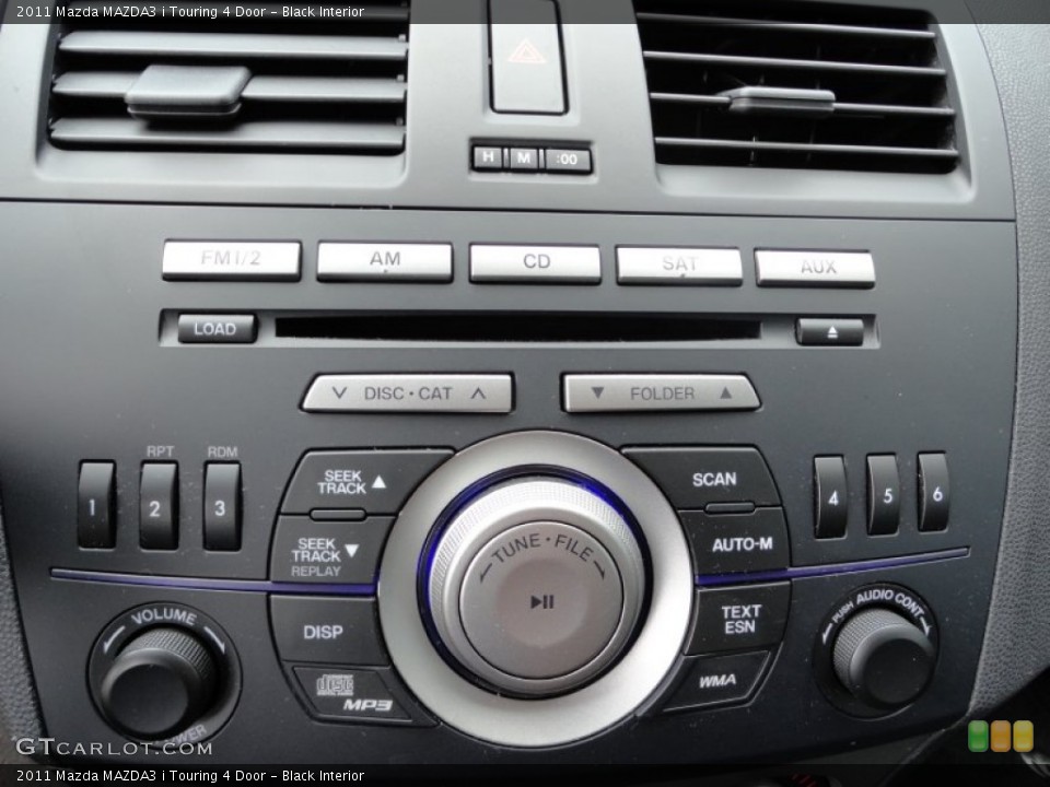 Black Interior Controls for the 2011 Mazda MAZDA3 i Touring 4 Door #50655358