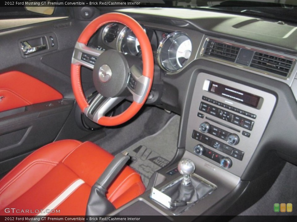 Brick Red/Cashmere Interior Dashboard for the 2012 Ford Mustang GT Premium Convertible #50684361