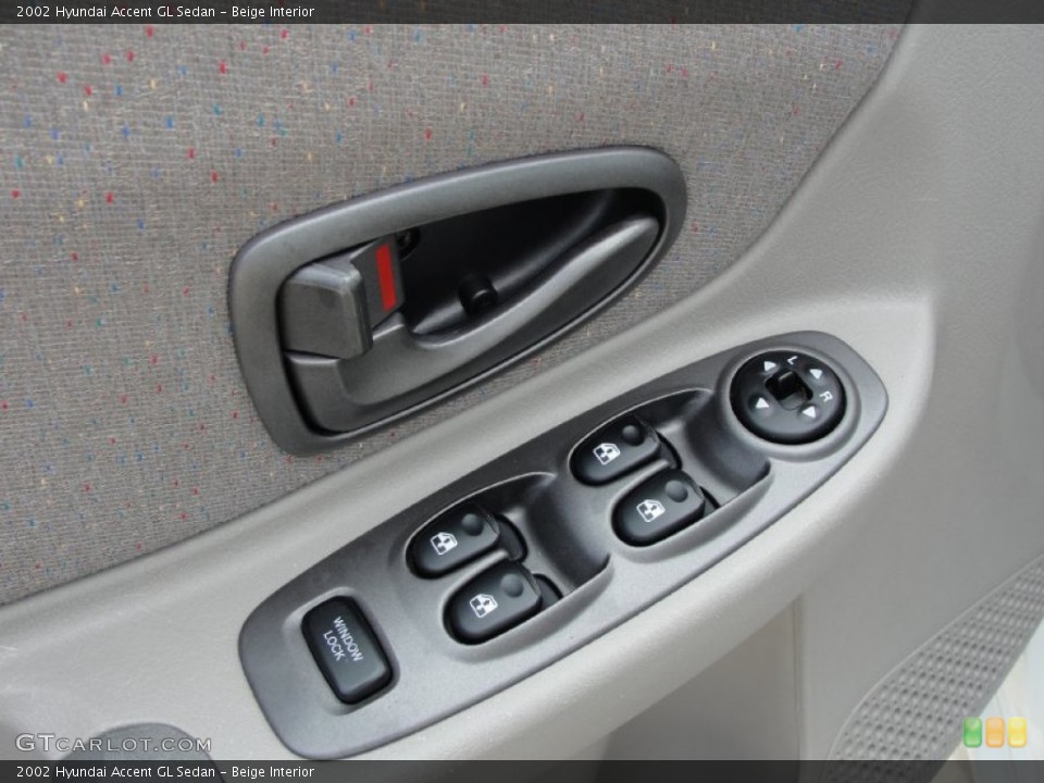 Beige Interior Controls for the 2002 Hyundai Accent GL Sedan #50705620