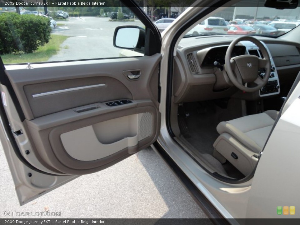 Pastel Pebble Beige Interior Door Panel for the 2009 Dodge Journey SXT #50724944