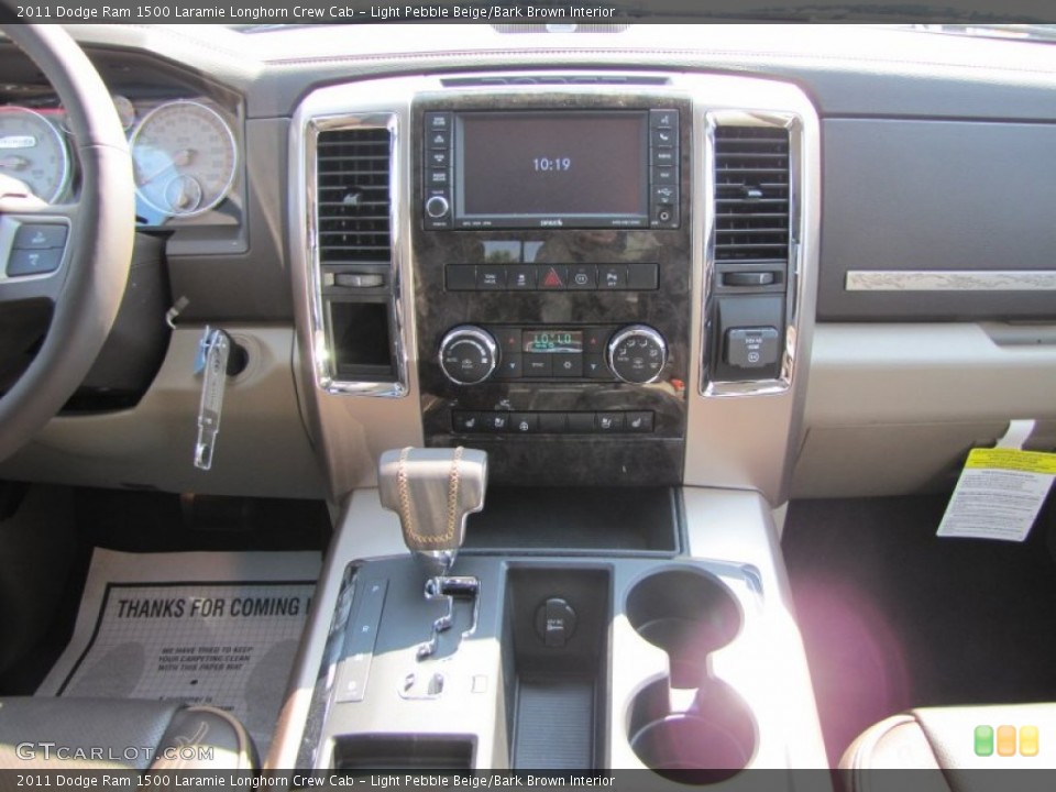 Light Pebble Beige/Bark Brown Interior Dashboard for the 2011 Dodge Ram 1500 Laramie Longhorn Crew Cab #50739276