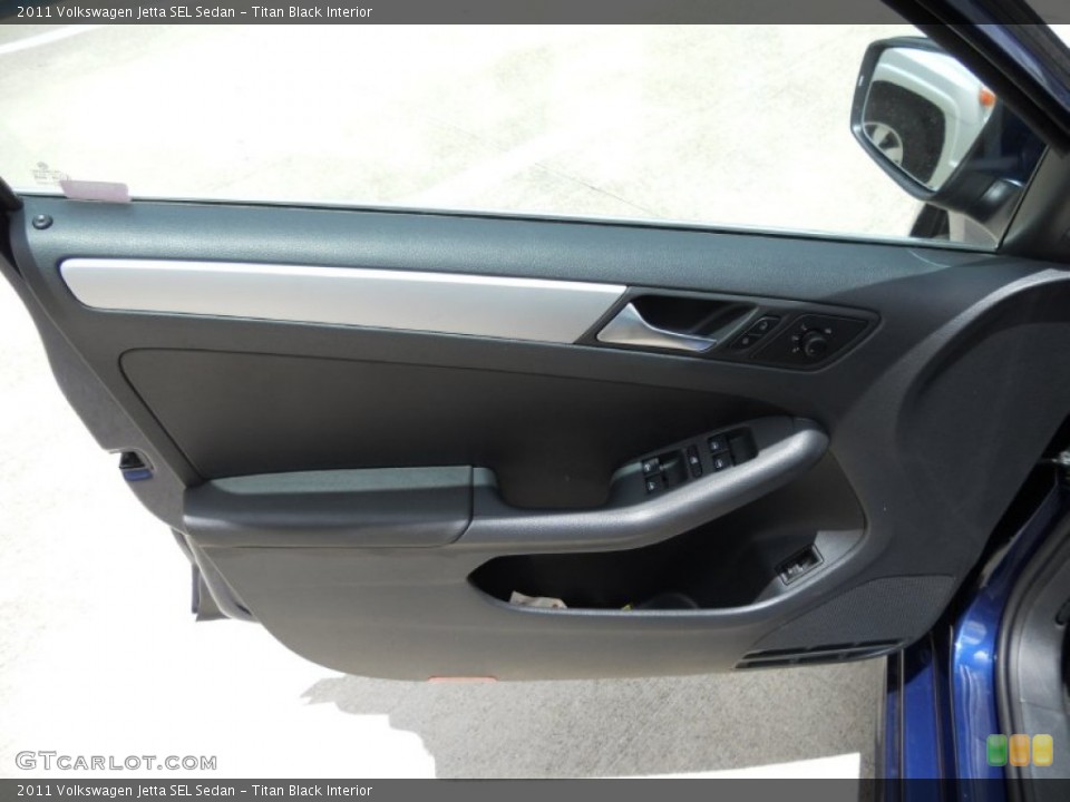 Titan Black Interior Door Panel for the 2011 Volkswagen Jetta SEL Sedan #50753364