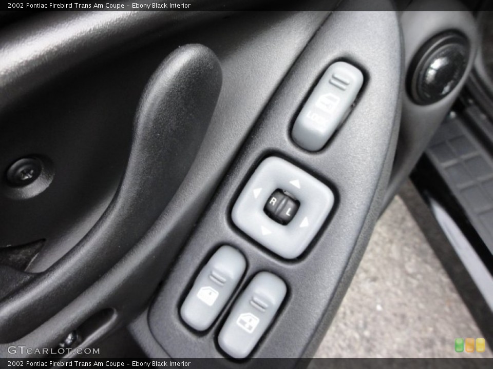Ebony Black Interior Controls for the 2002 Pontiac Firebird Trans Am Coupe #50792013