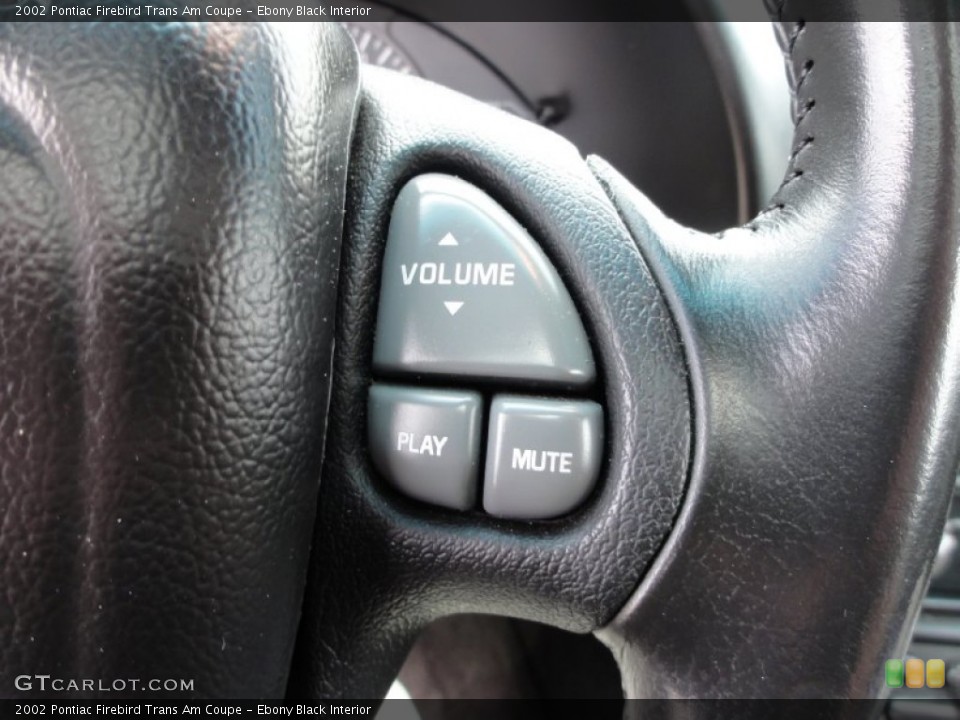 Ebony Black Interior Controls for the 2002 Pontiac Firebird Trans Am Coupe #50792508