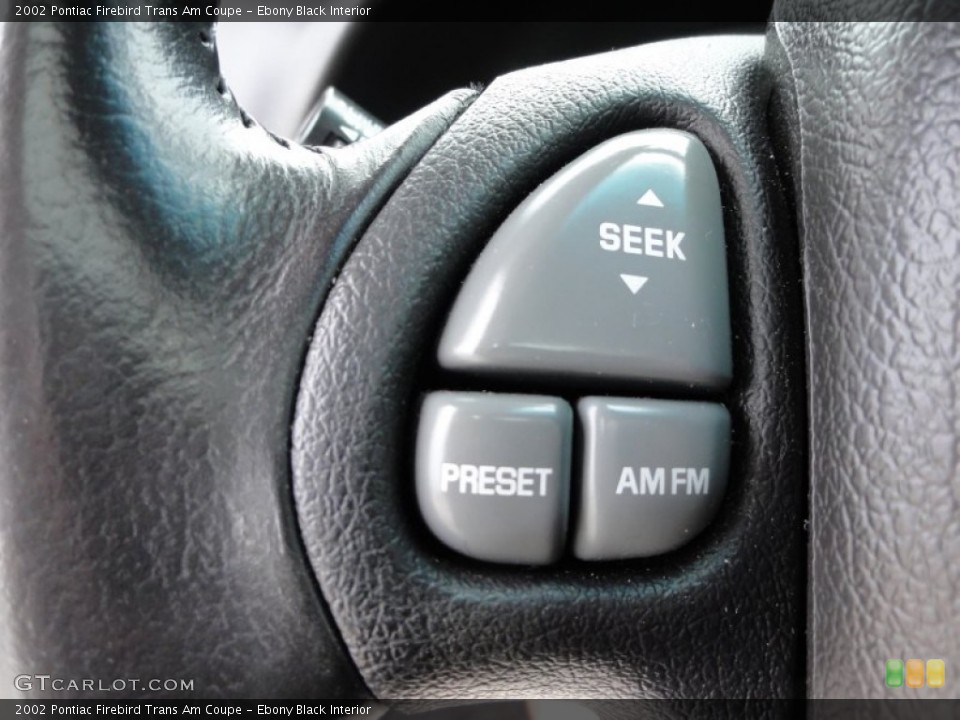 Ebony Black Interior Controls for the 2002 Pontiac Firebird Trans Am Coupe #50792526