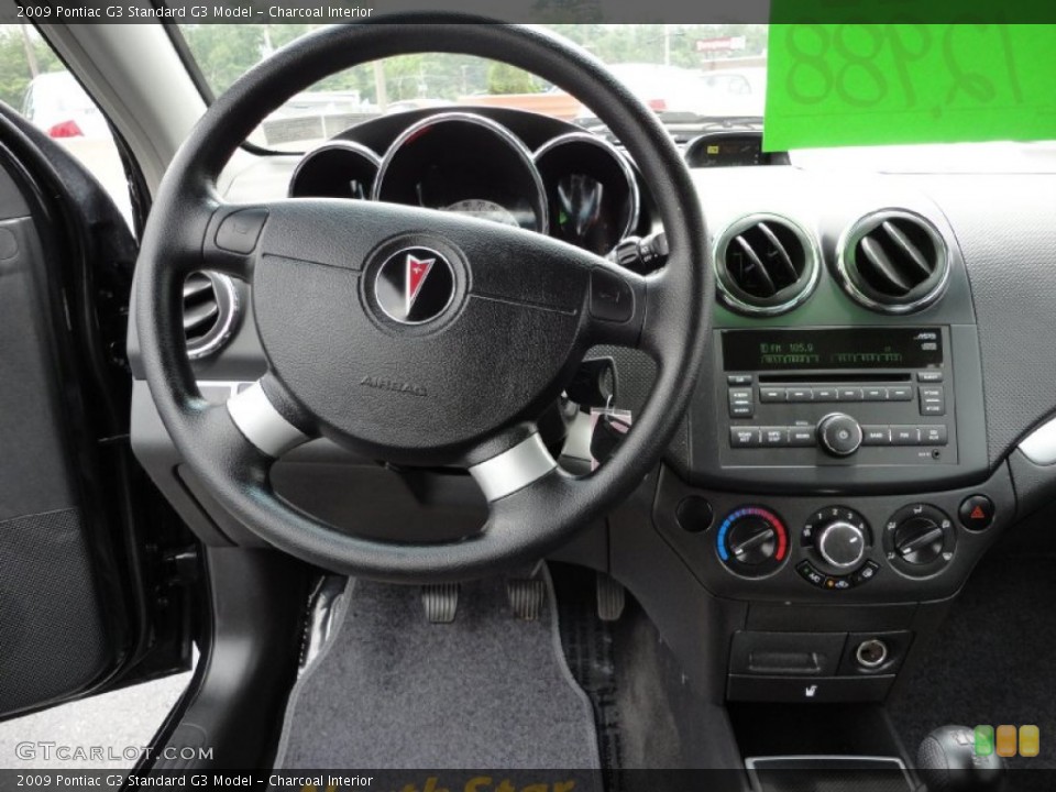 Charcoal Interior Controls for the 2009 Pontiac G3  #50795970