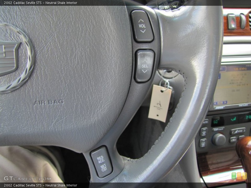 Neutral Shale Interior Controls for the 2002 Cadillac Seville STS #50799093