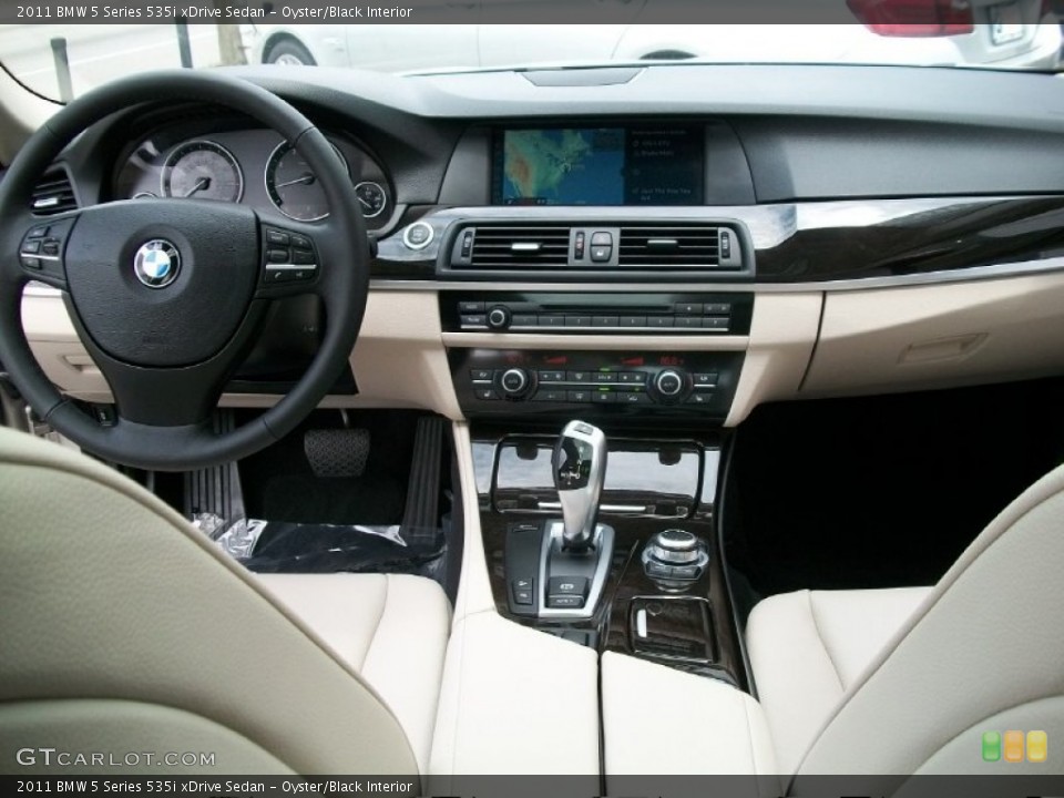 Oyster/Black Interior Dashboard for the 2011 BMW 5 Series 535i xDrive Sedan #50809866