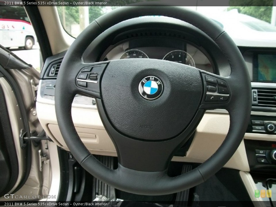Oyster/Black Interior Steering Wheel for the 2011 BMW 5 Series 535i xDrive Sedan #50809878