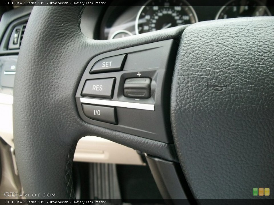Oyster/Black Interior Controls for the 2011 BMW 5 Series 535i xDrive Sedan #50809890