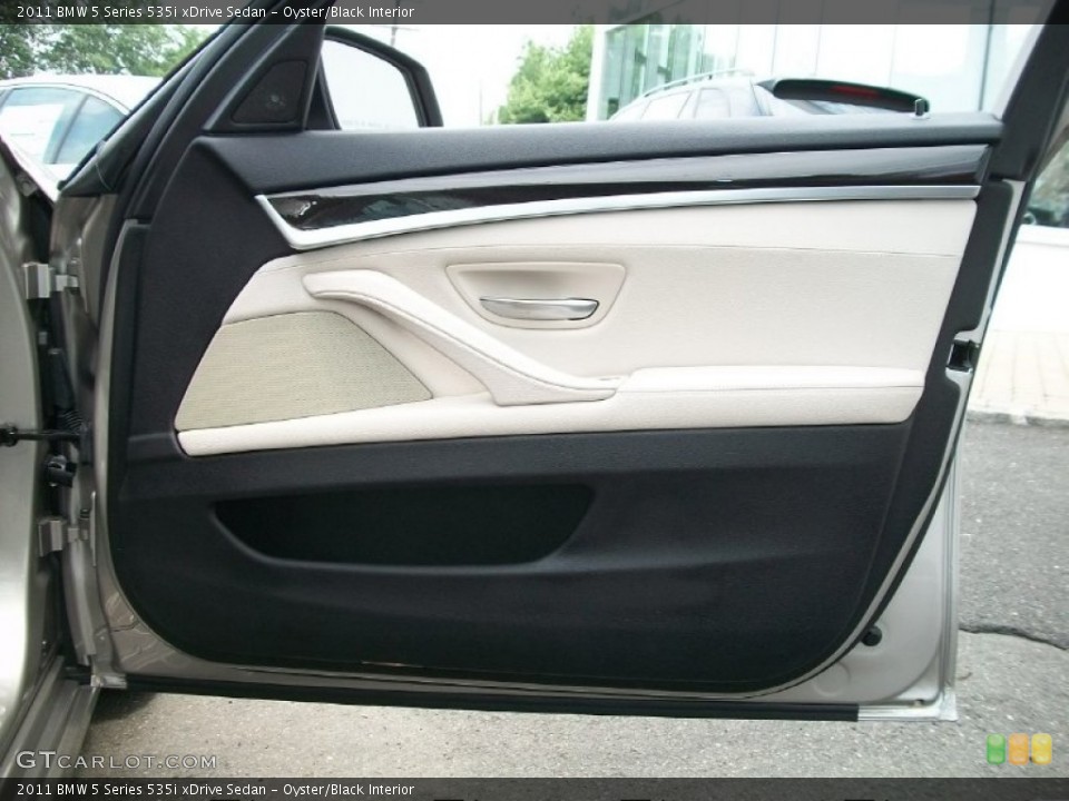 Oyster/Black Interior Door Panel for the 2011 BMW 5 Series 535i xDrive Sedan #50810079