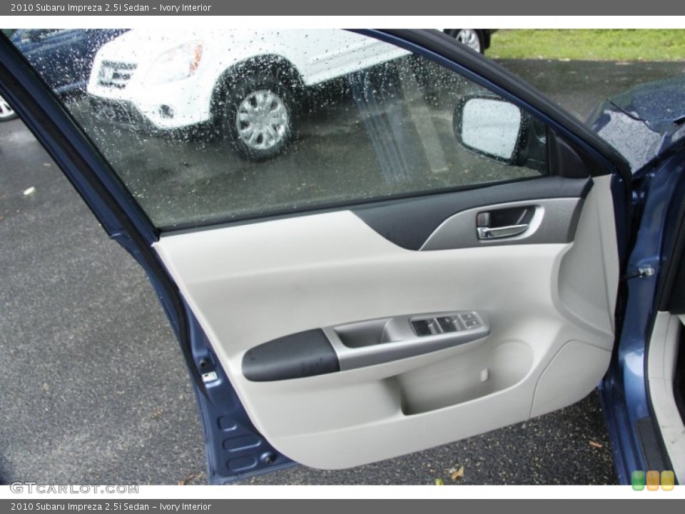 Ivory Interior Door Panel for the 2010 Subaru Impreza 2.5i Sedan #50874496