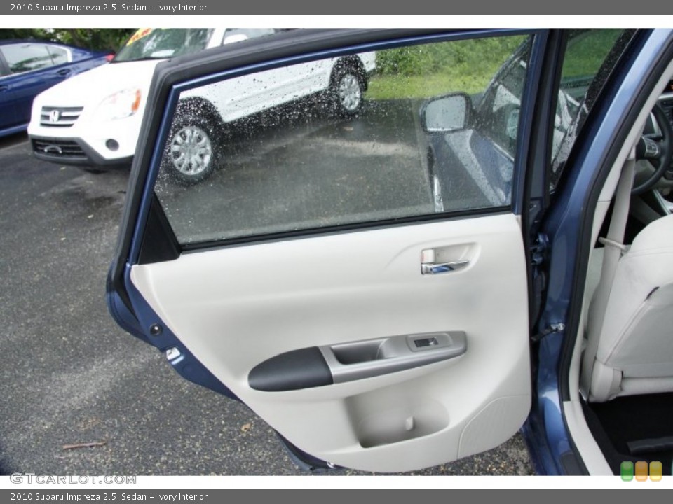 Ivory Interior Door Panel for the 2010 Subaru Impreza 2.5i Sedan #50874514